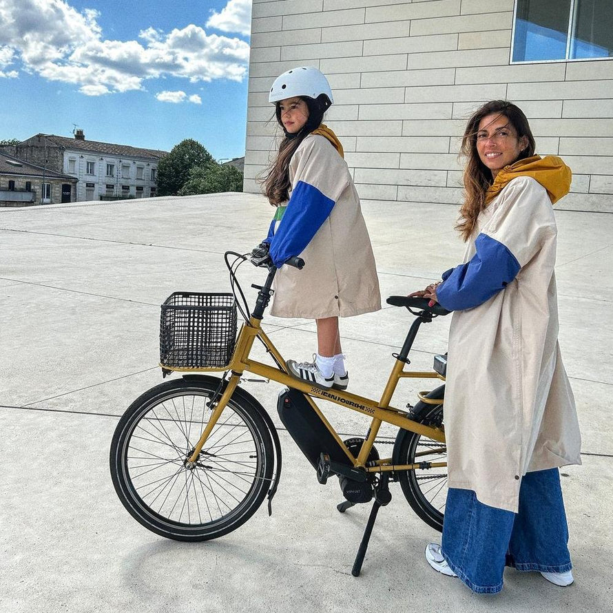 Poncho de pluie Poule Party Old School
d'une maman et son enfant