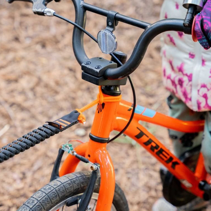 Tire Vélo : tracter votre enfant dans les cotes.